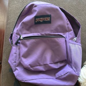 Purple Jansport back pack in perfect condition